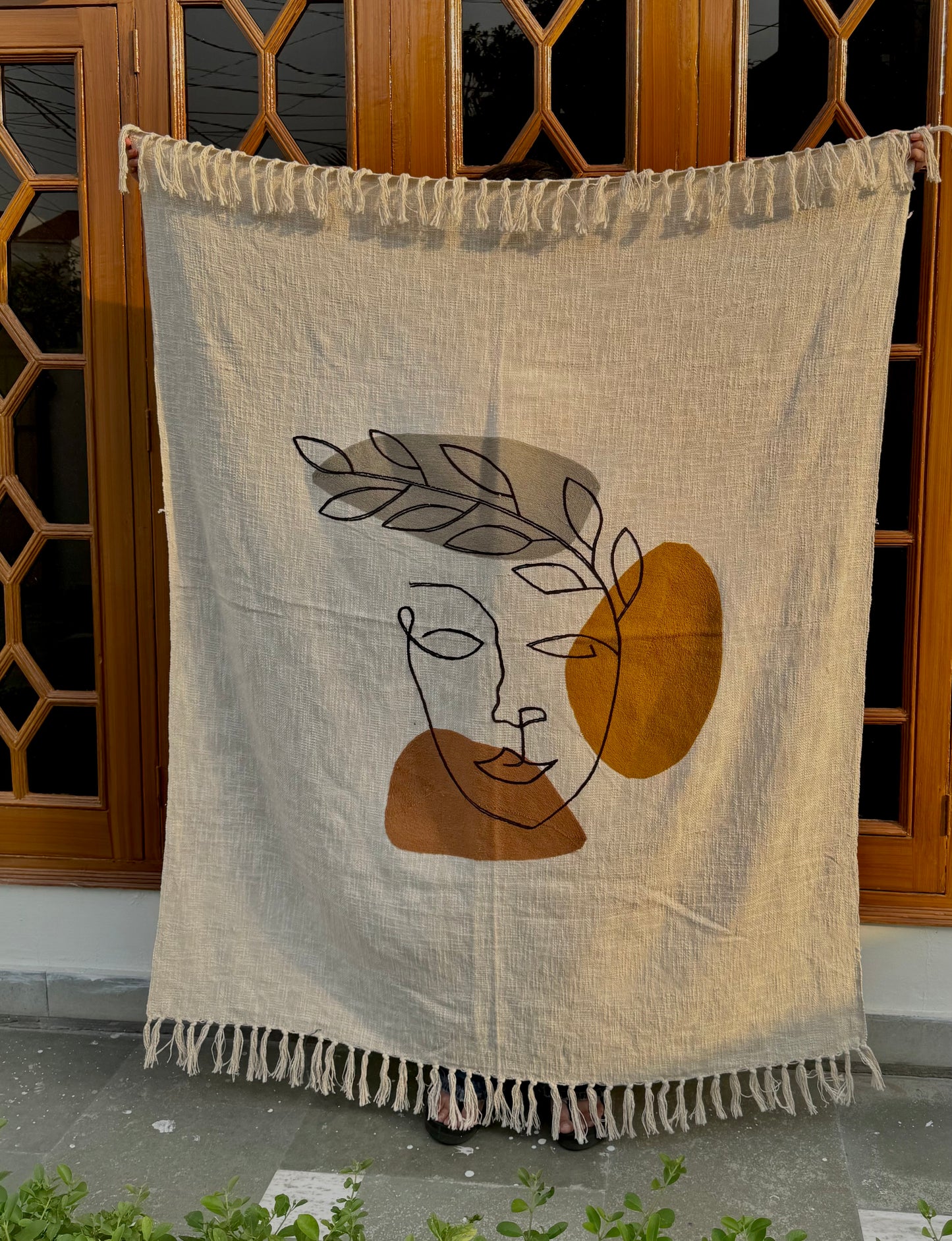 Face Embroidered Sofa Throw